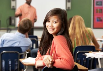 Female Teenage Pupil In Classroom