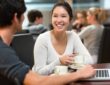 Students chatting in college cafe