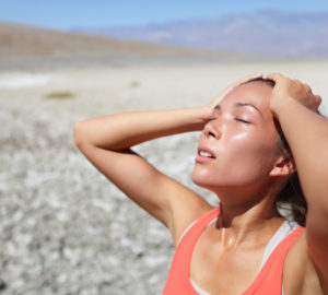 Desert woman thirsty dehydrated in Death Valley